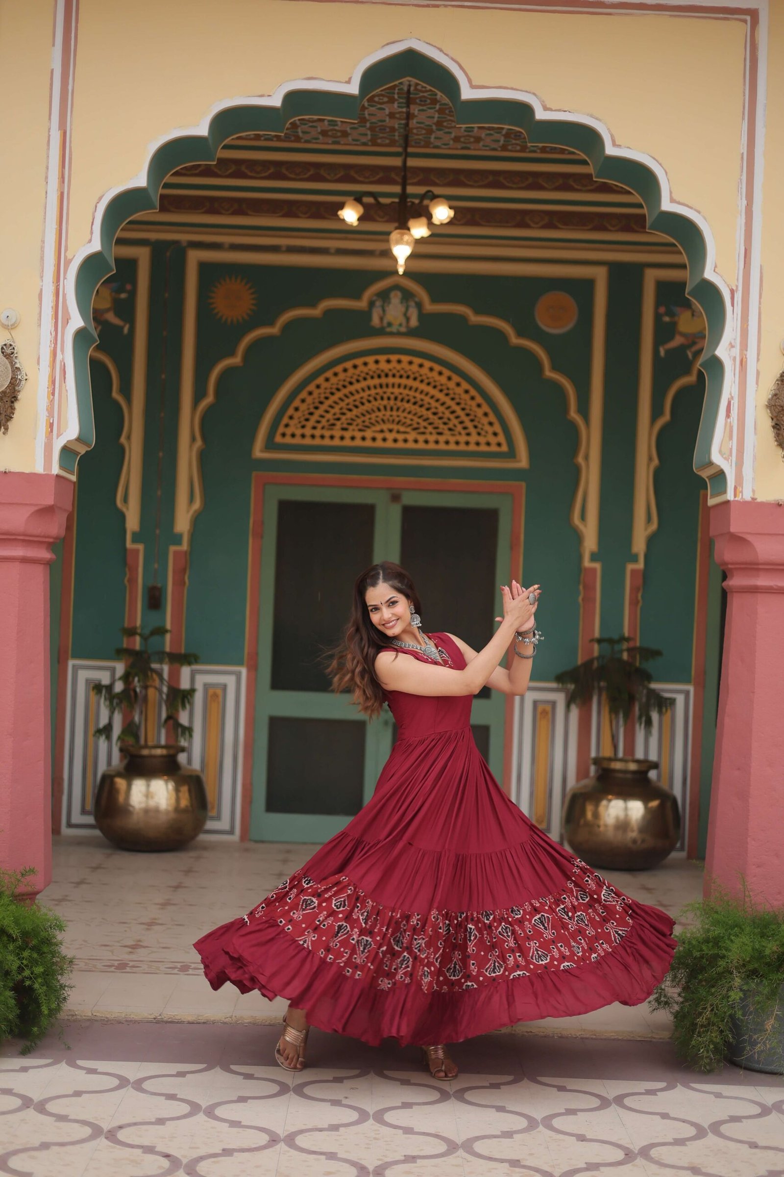 Maroon Designer Heavy Reyon Gown with Printed Frill & Fancy V-Neck